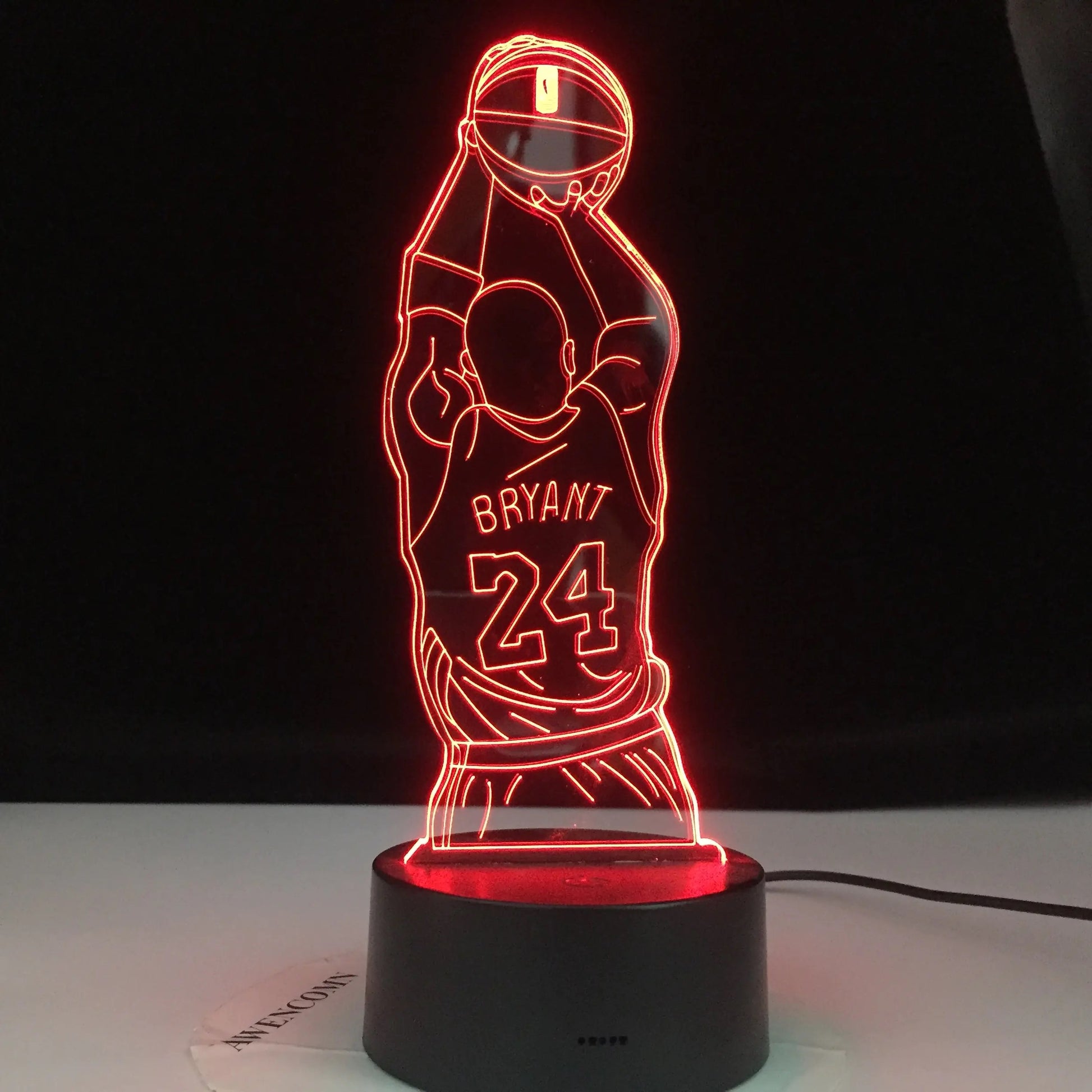 LED basketball lamp showing multiple color options with remote control